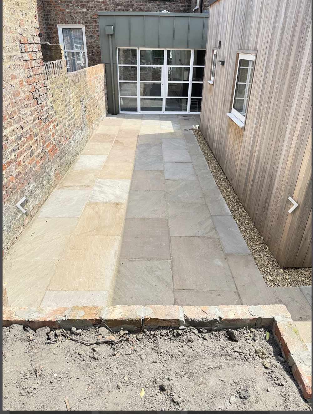 Natural Indian stone patio laid in York city by RW Builders